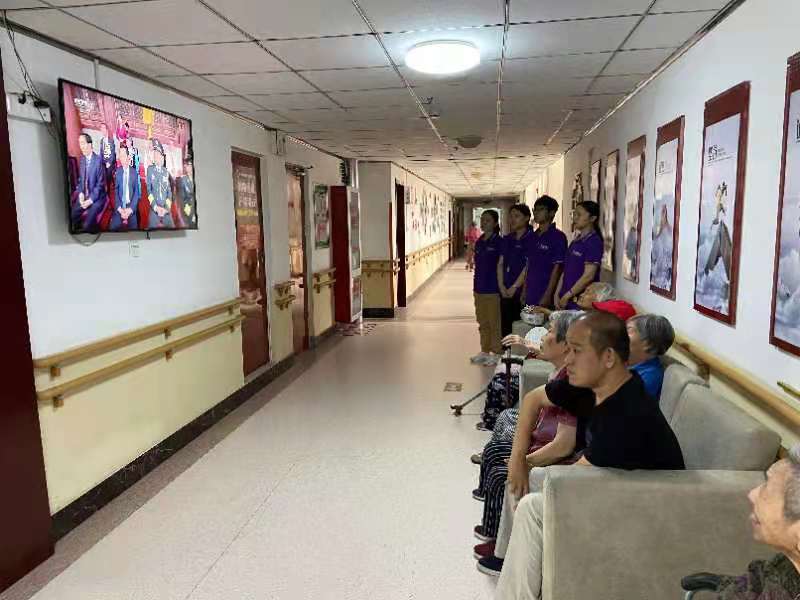 中心组织观看庆祝中国共产党成立一百周年大会